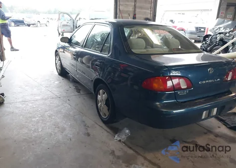 1999 Toyota Corolla Le z USA, uszkodzony, nr VIN 1NXBR18EXXZ169977